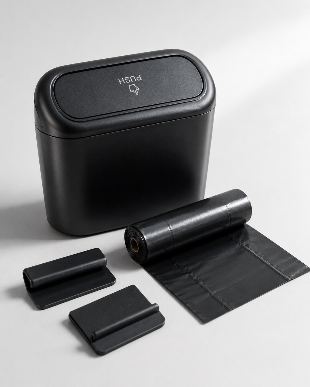 Black car trash bin with liner bags and clips