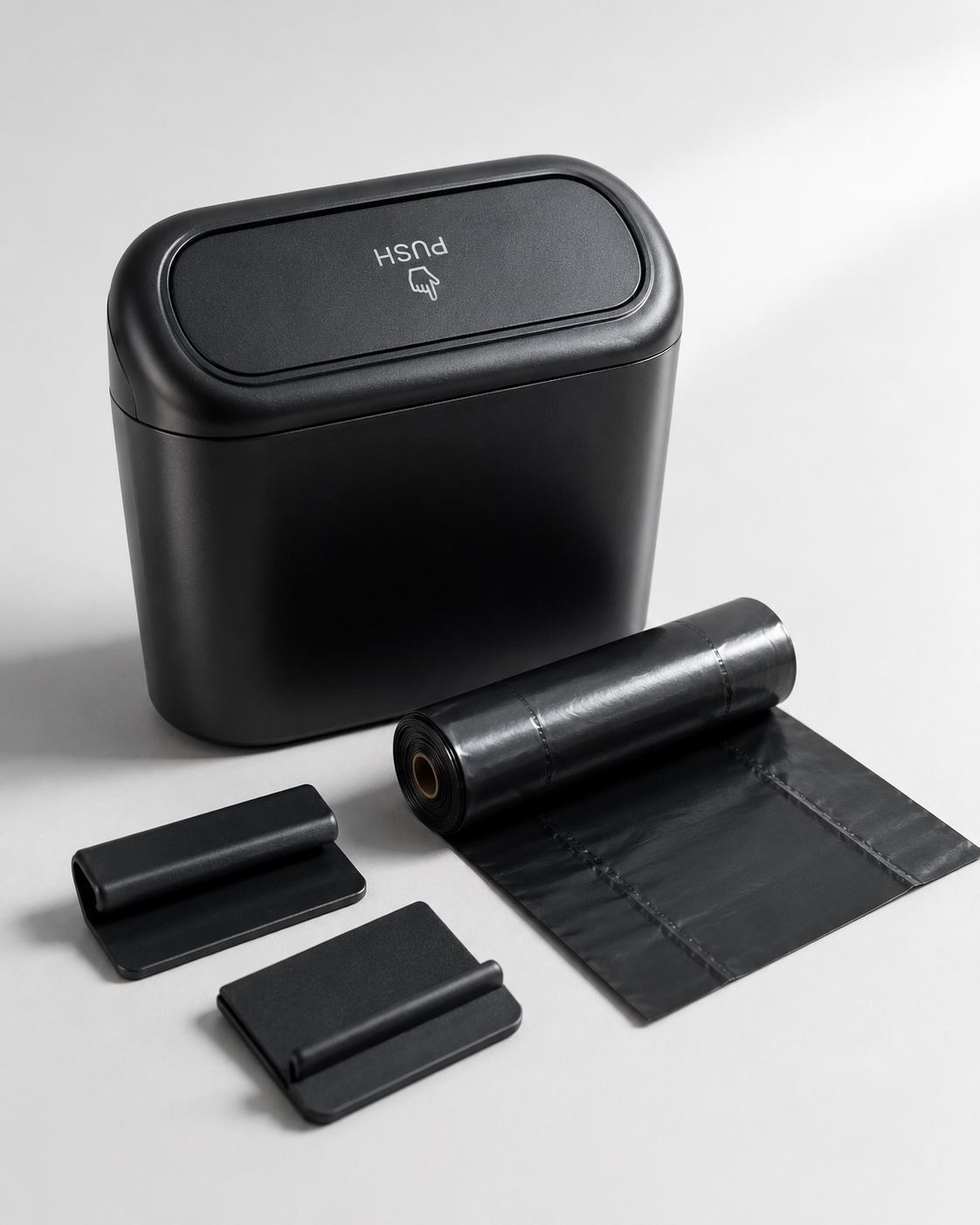 Black car trash bin with liner bags and clips