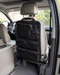 Black seat back organizer installed on a car seat